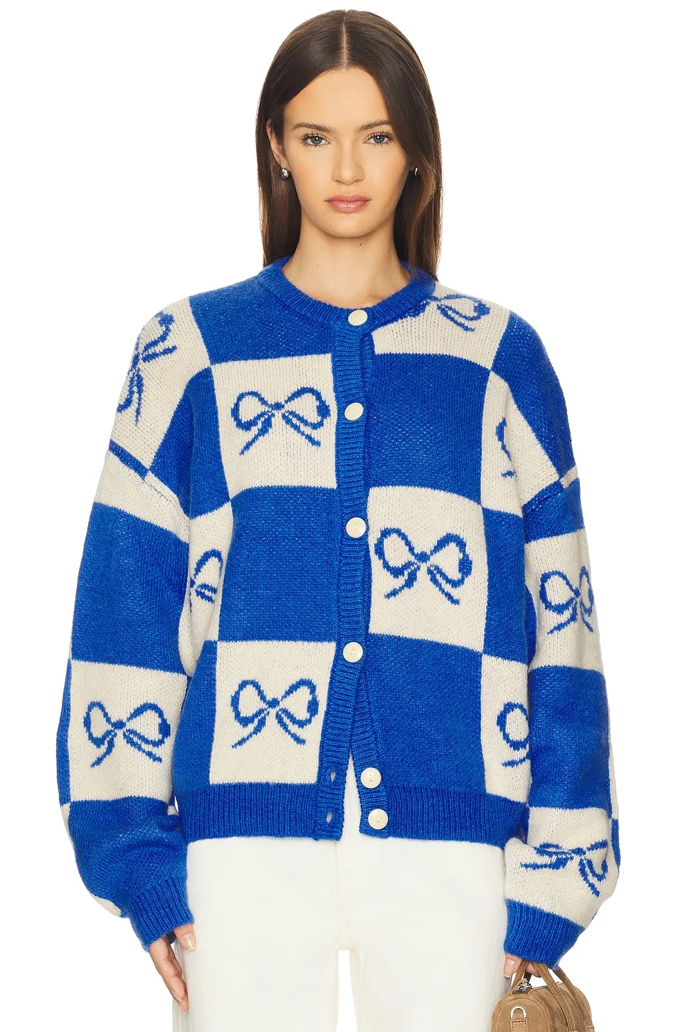 Lisa Says Gah chunky hand-knit cardigan buttoned through the front.